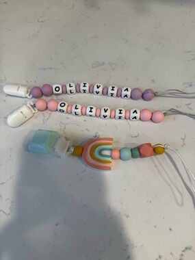 Personalized 'Olivia' Pink Beaded Pacifier Clips with Rainbow Charm